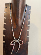 Load image into Gallery viewer, Sterling silver pink conch bow necklace 25 inch