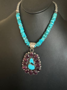 Navajo sterling silver turquoise purple spiny pendant